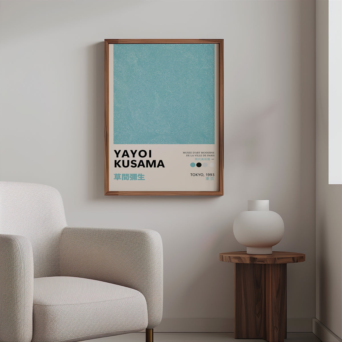 Yayoi Kusama inspired turquoise dotted texture print above a cream boucle armchair