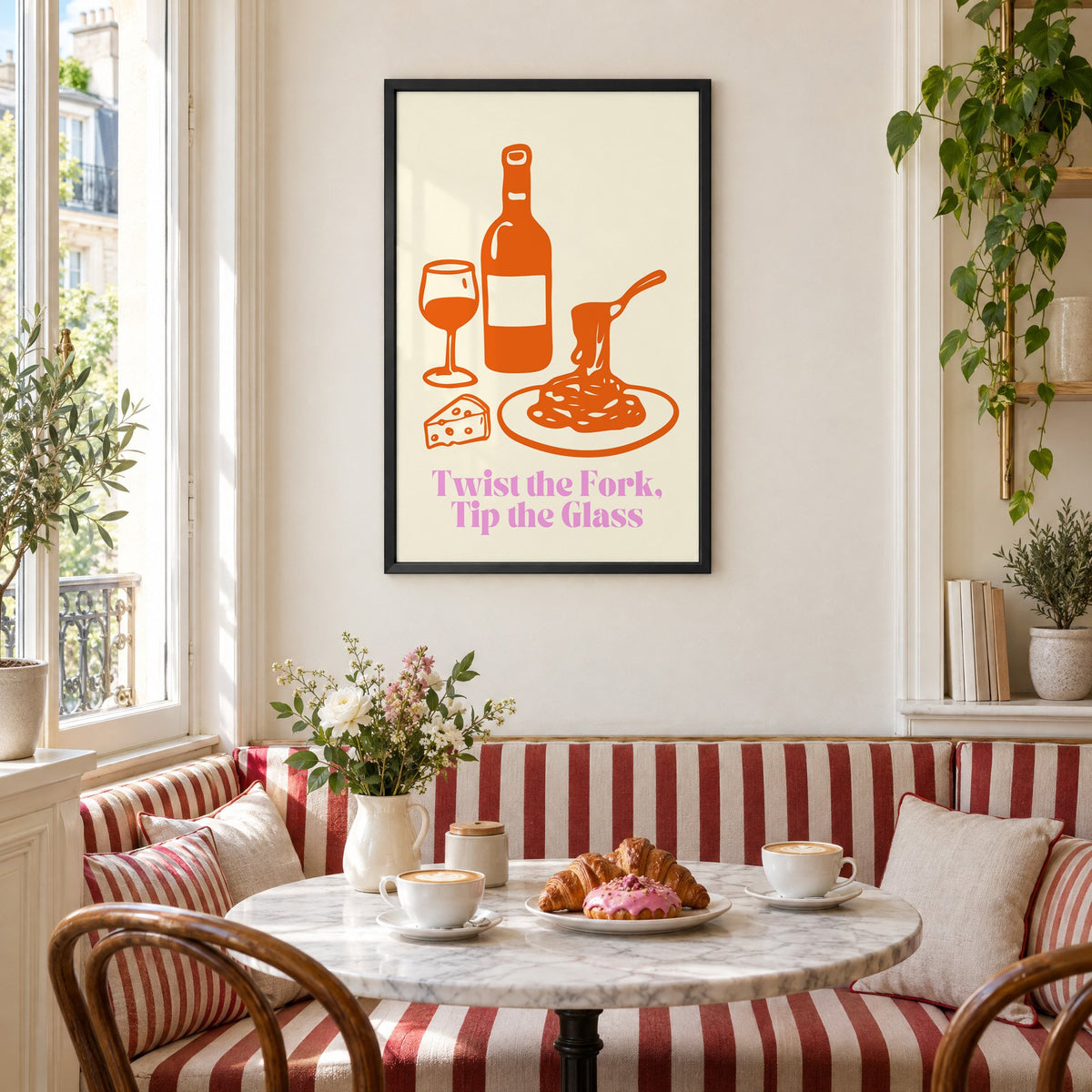 Twist the Fork, Tip the Glass wine and pasta print in a black frame above a striped cafe breakfast nook with cappuccino and pastries