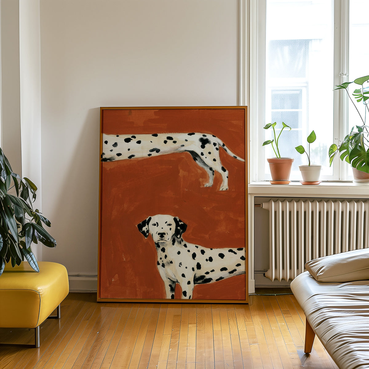 Cropped Dalmatians print in an oak frame leaning beside a yellow leather bench