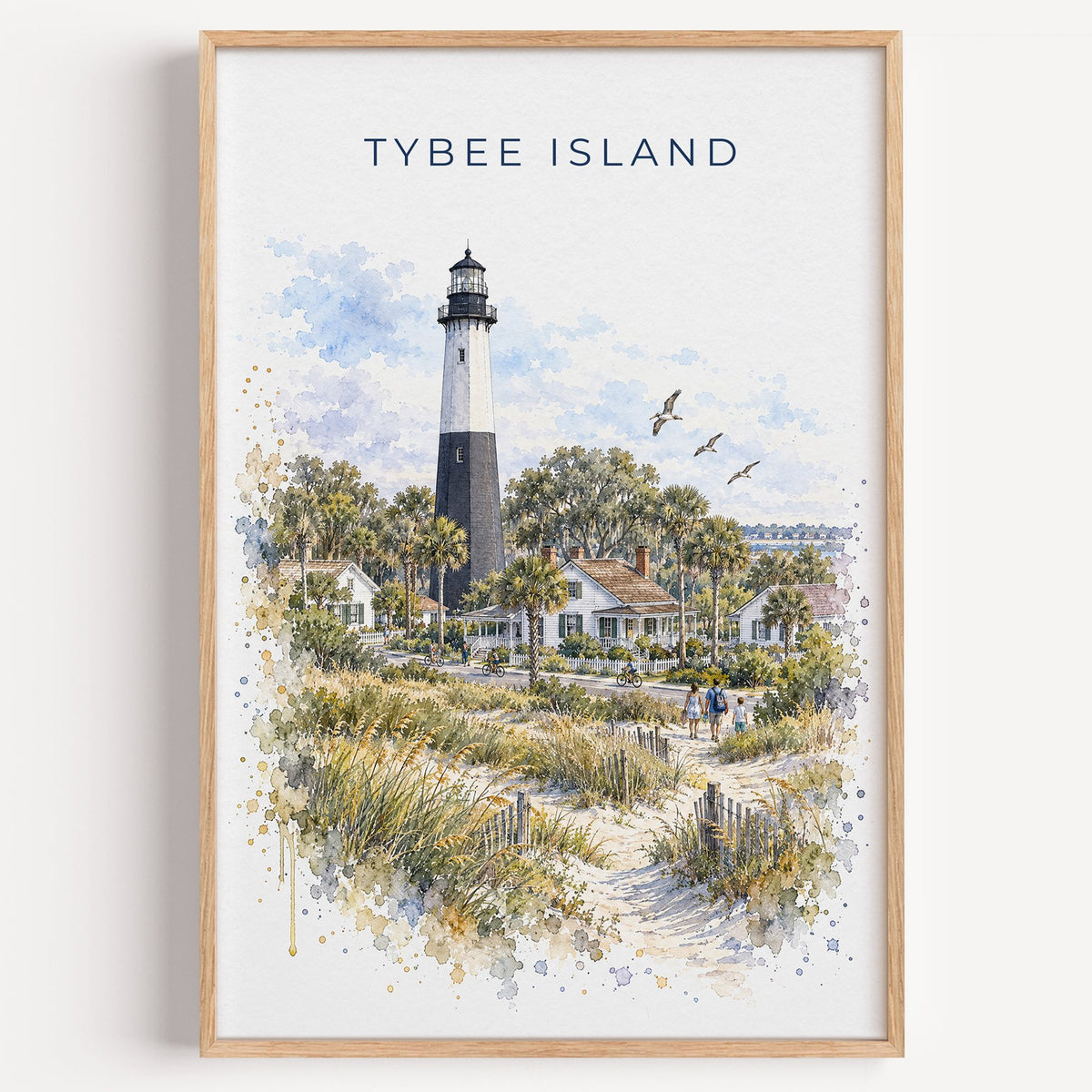 Tybee Island watercolor print in a light oak frame on a plain white wall