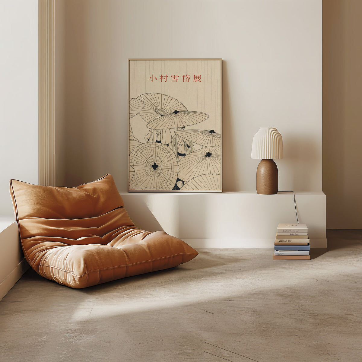 paper umbrellas in the rain line art print in a light oak frame on a white ledge by a tan leather floor chair