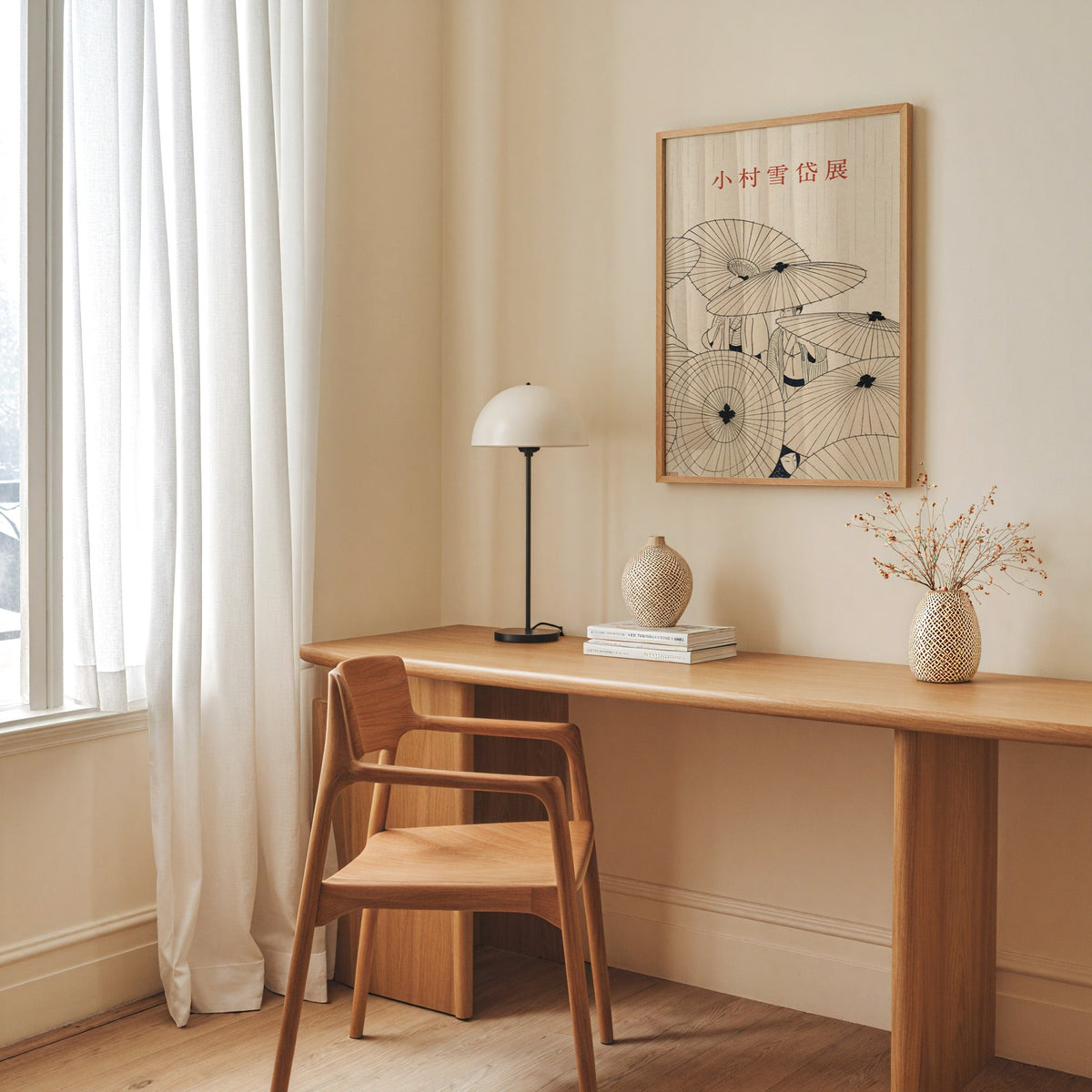 paper umbrellas in the rain line art print in an oak frame above a long oak desk with a white dome lamp and woven vases