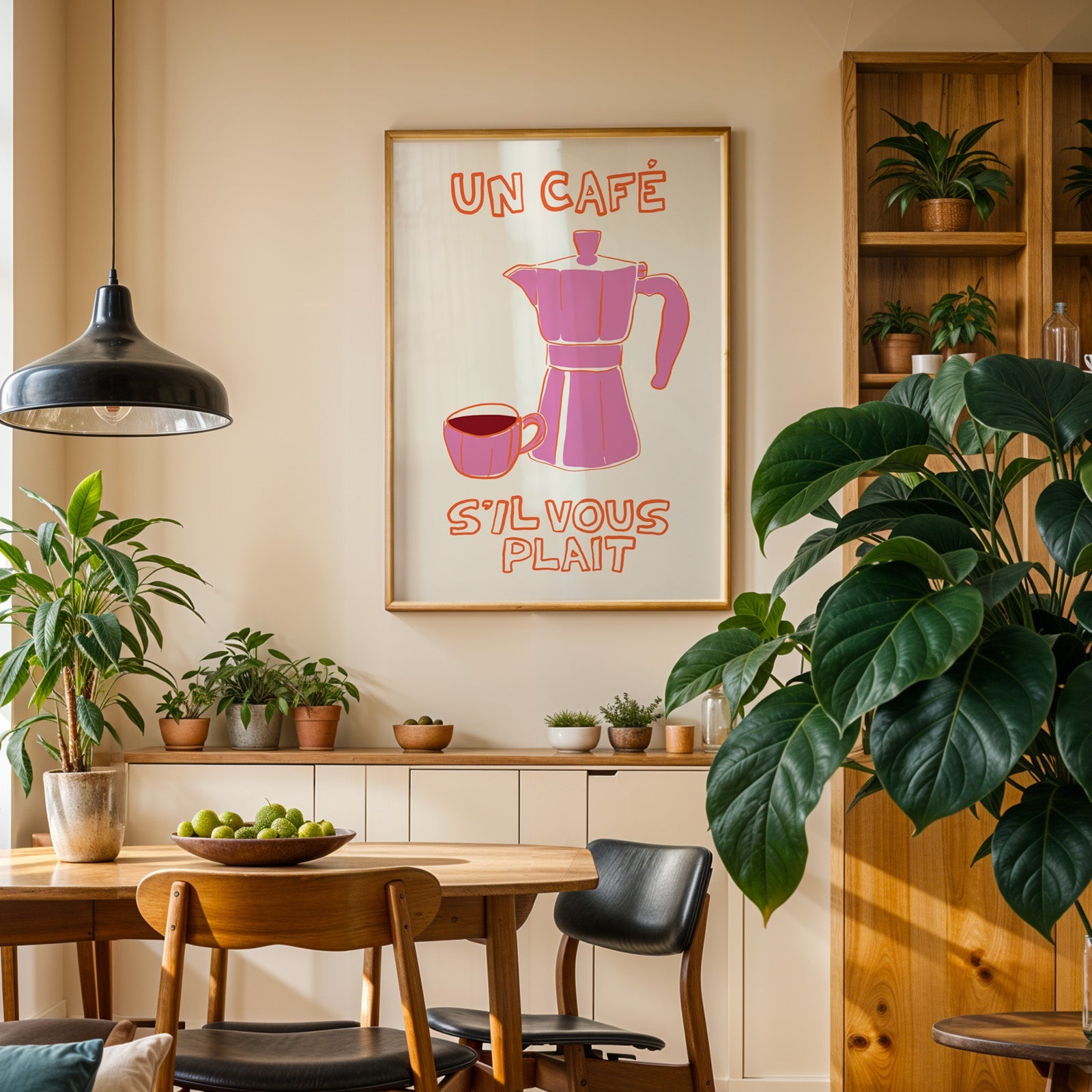 Un cafe pink moka pot print in an oak frame above a sideboard in a dining room