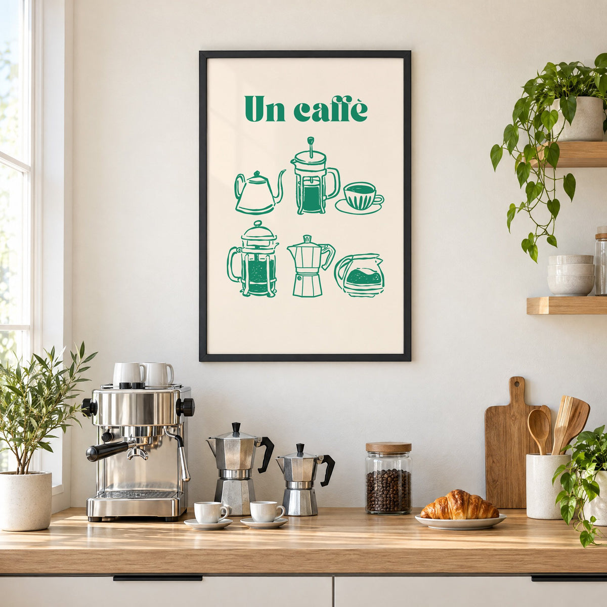 Un caffè green coffee makers print in a black frame above a home espresso bar with moka pots and espresso cups