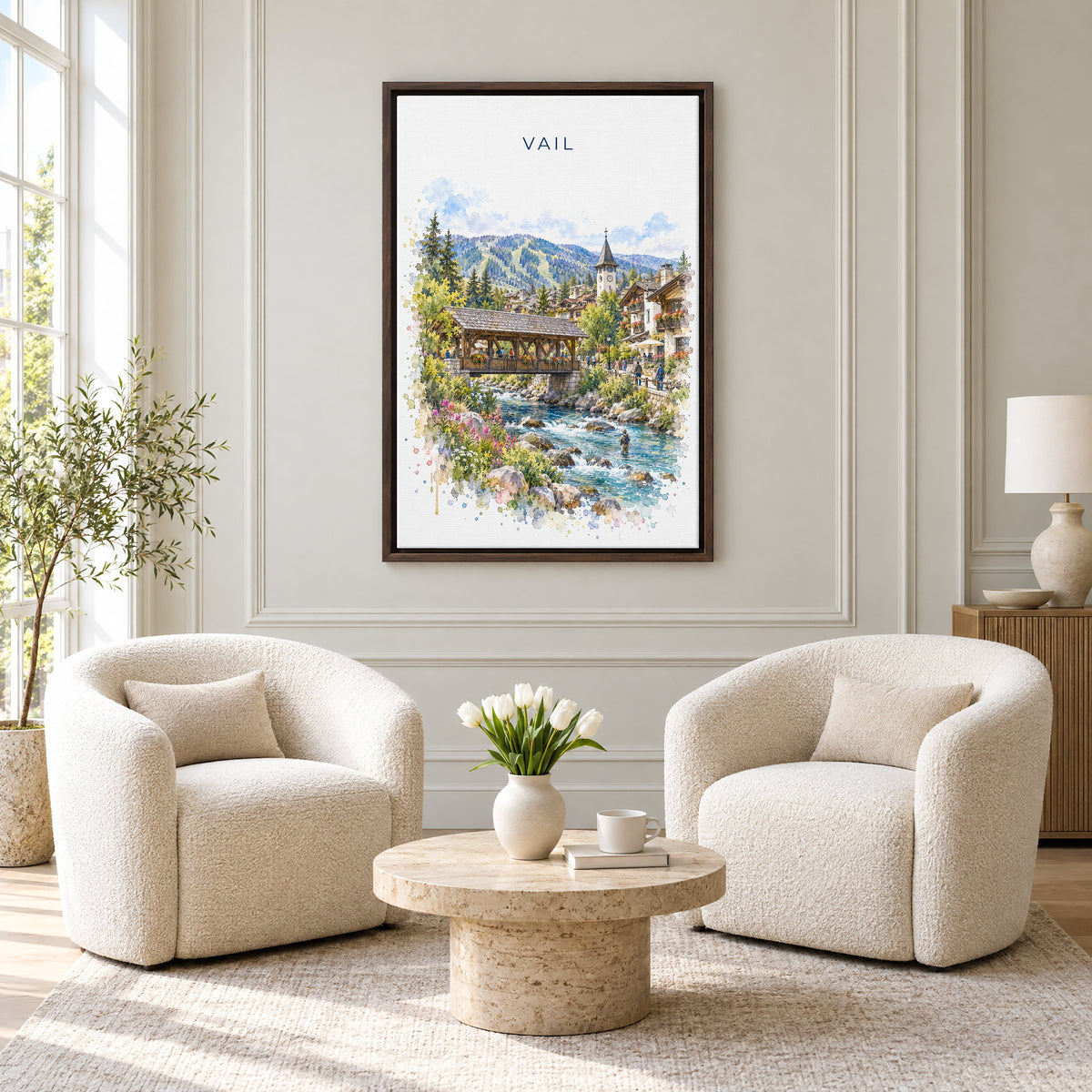 Vail, Colorado watercolor print as an espresso floater canvas above two boucle armchairs in a hotel lounge