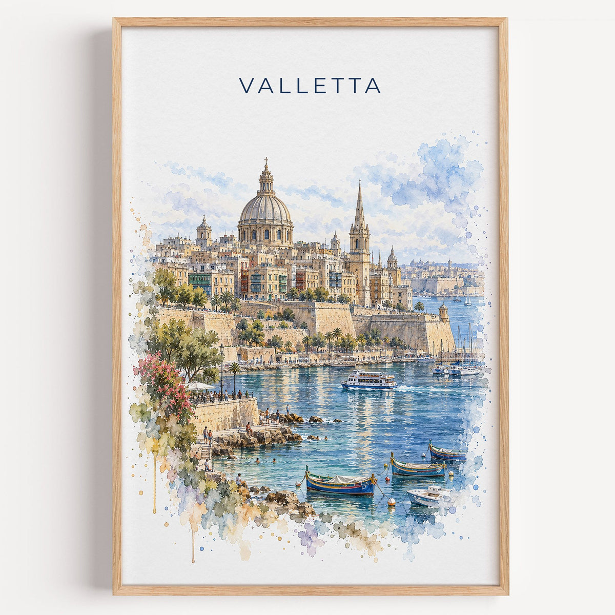 Valletta watercolor print in a light oak frame on a plain white wall