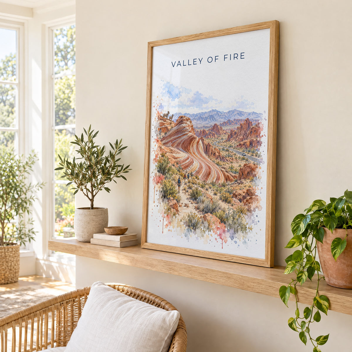 Valley of Fire watercolor print in an oak frame on a picture ledge in a sunlit sunroom