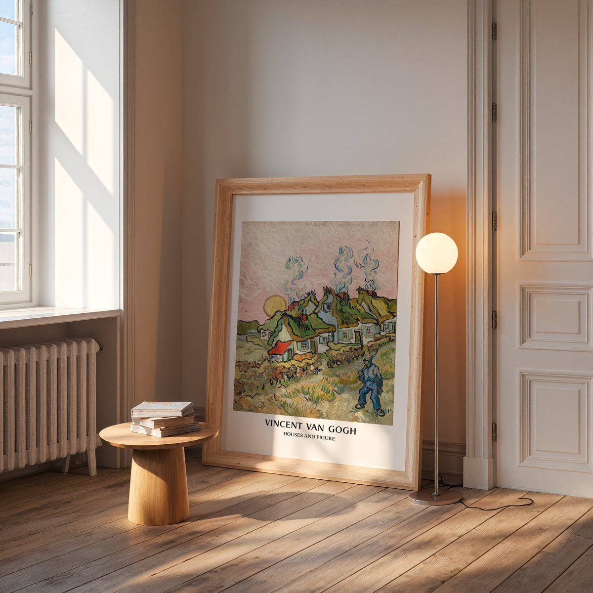 Van Gogh landscape print in a wide pine frame leaning by a sunlit window