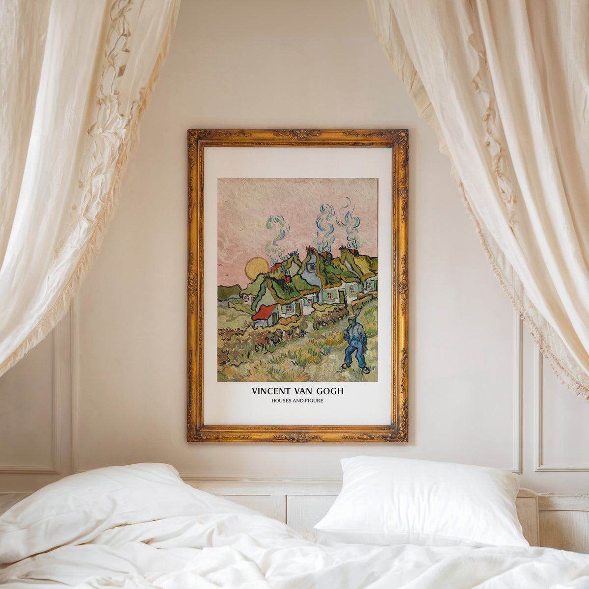 Houses and Figure print shown in an ornate gold frame above a canopy bed