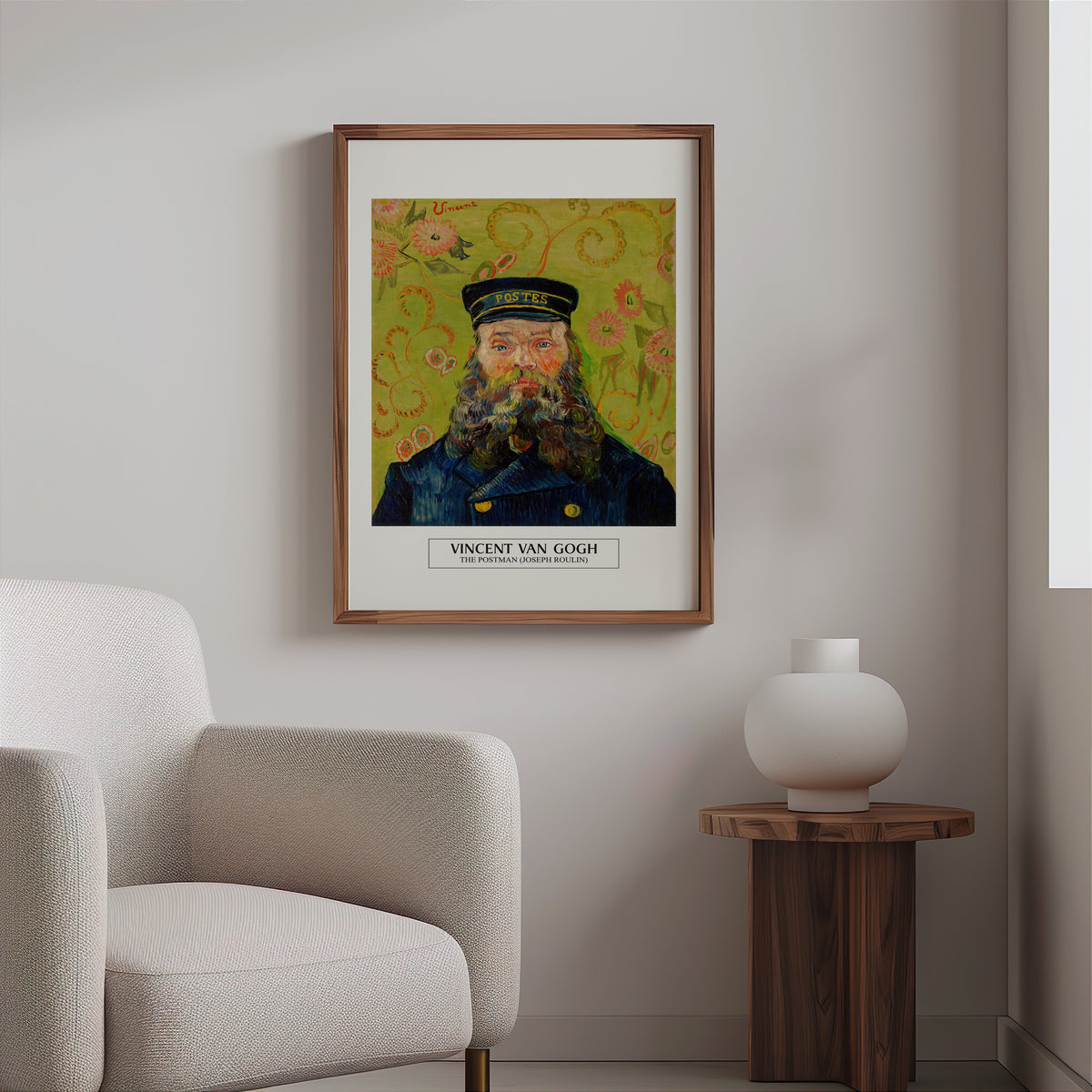 Van Gogh postman portrait print in a slim walnut frame above a bouclé armchair