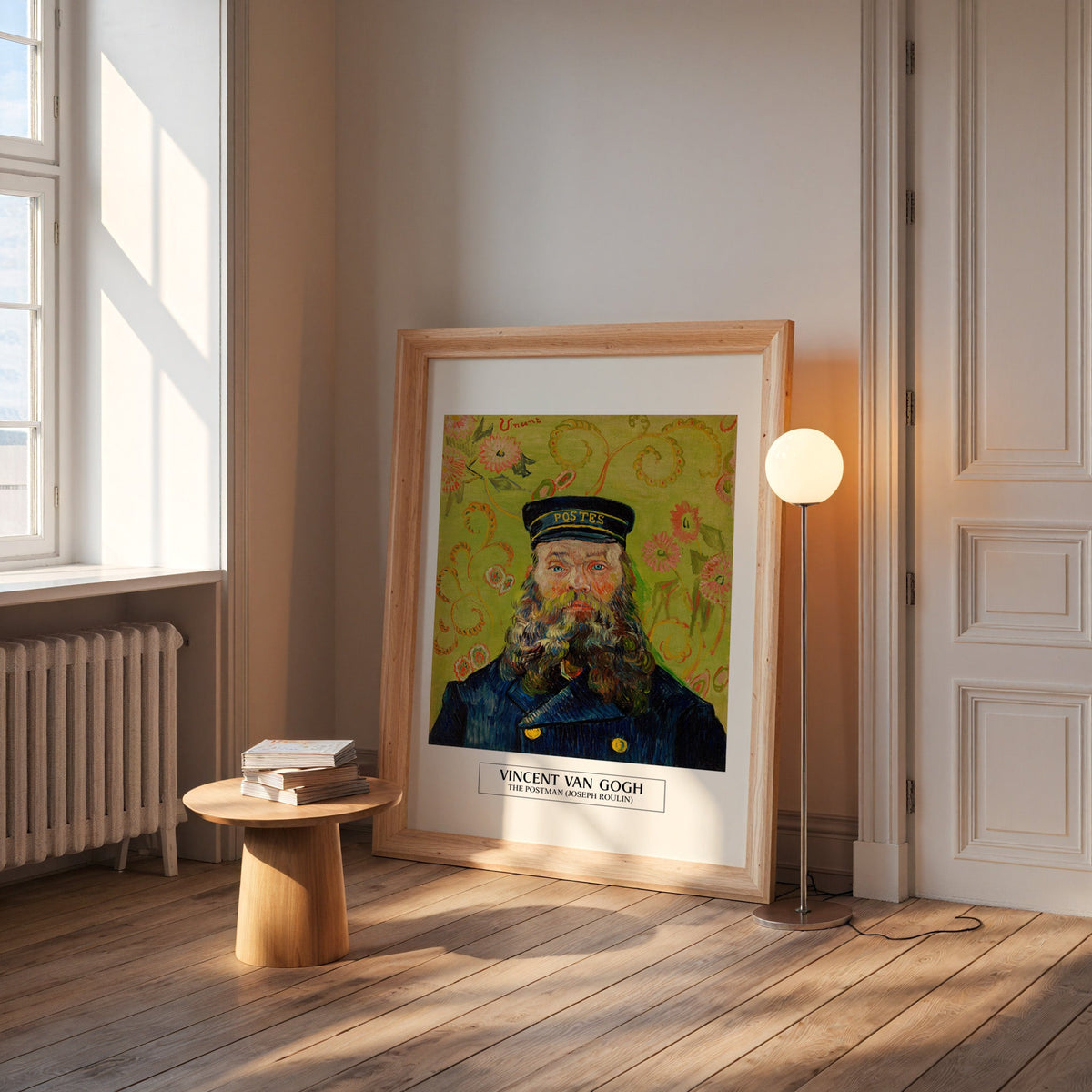 Van Gogh portrait print in a wide pine frame leaning by a sunlit window