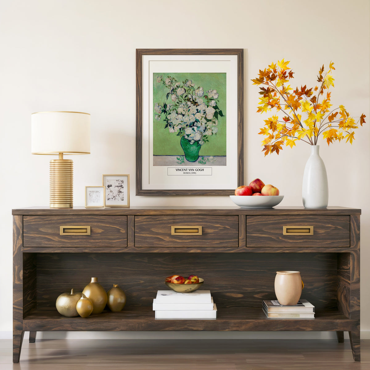 Van Gogh Roses print in a walnut frame above a console with autumn branches