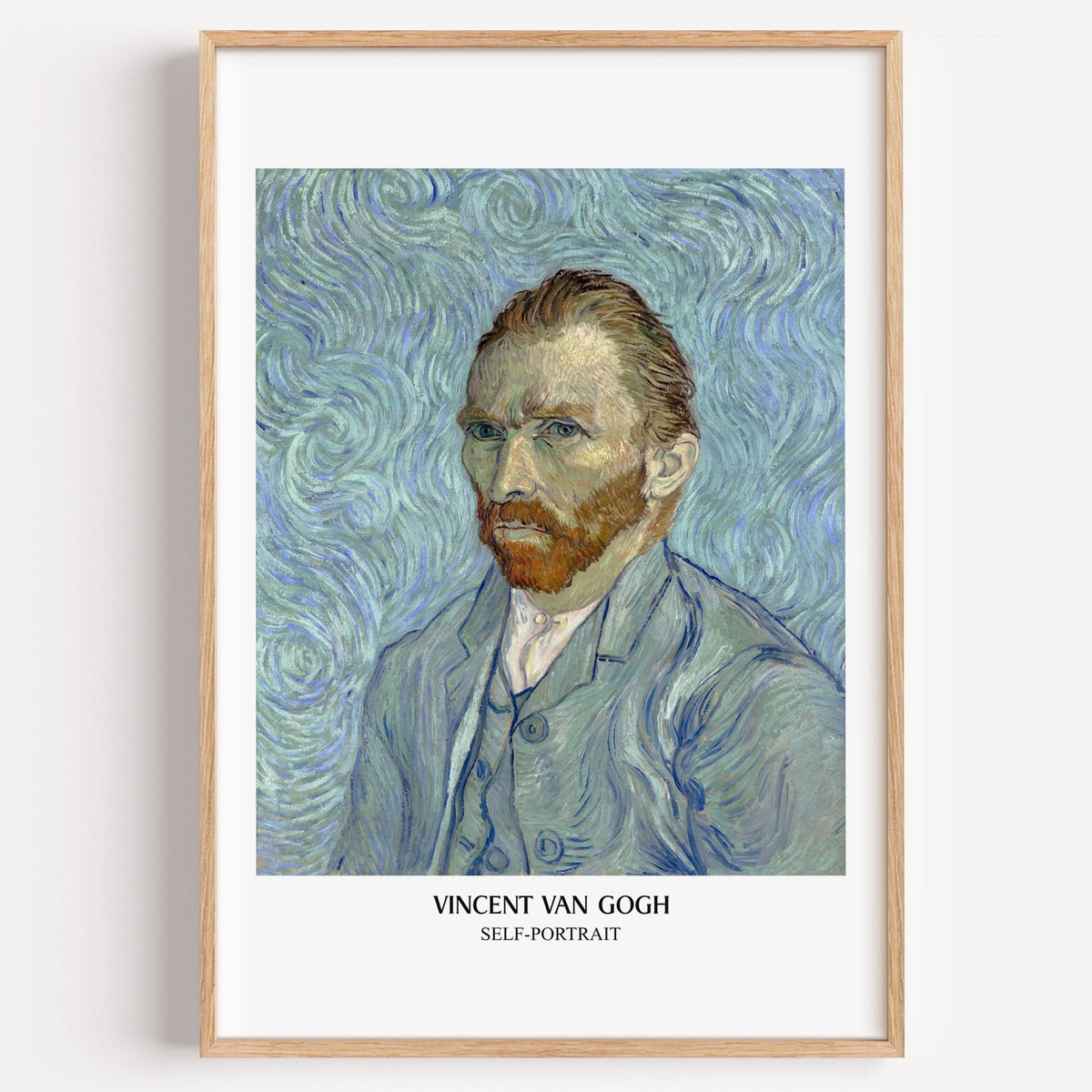 Van Gogh Self-Portrait print in a light oak frame on a plain white wall