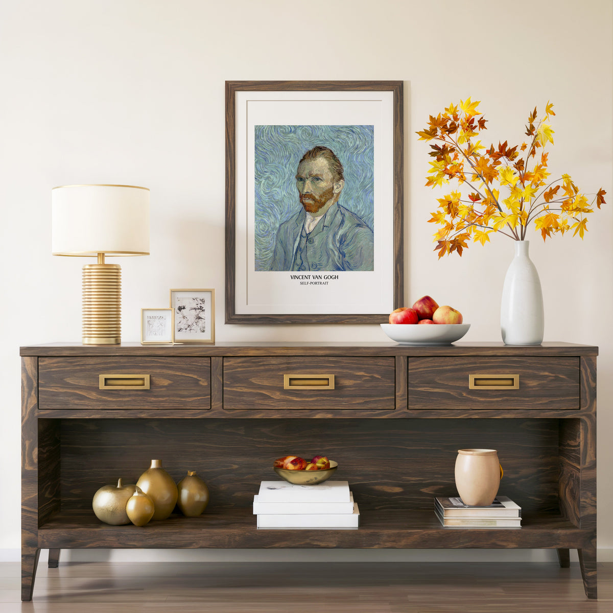 Van Gogh Self-Portrait in a walnut frame above a console with autumn branches