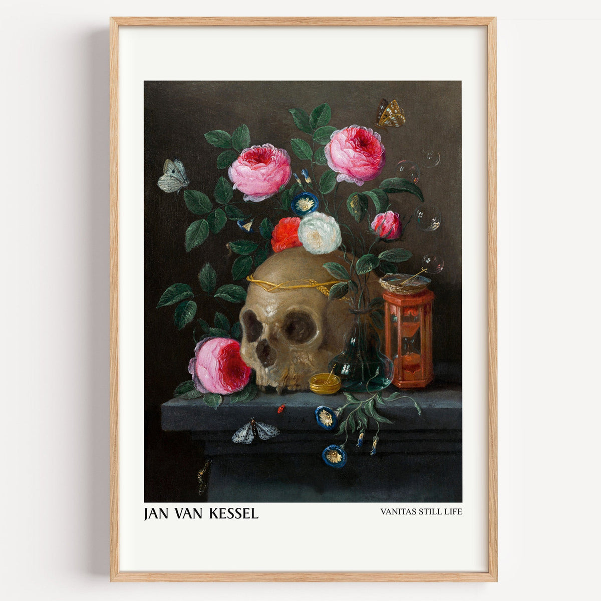 Jan van Kessel vanitas still life print in a light oak frame on a white wall