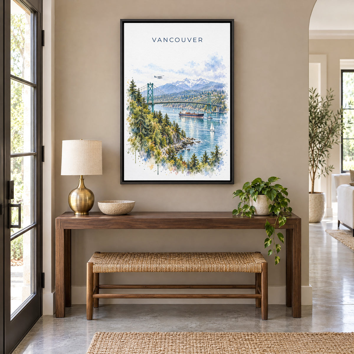 Vancouver watercolor print as a black floater canvas above a walnut console and woven bench in an entryway