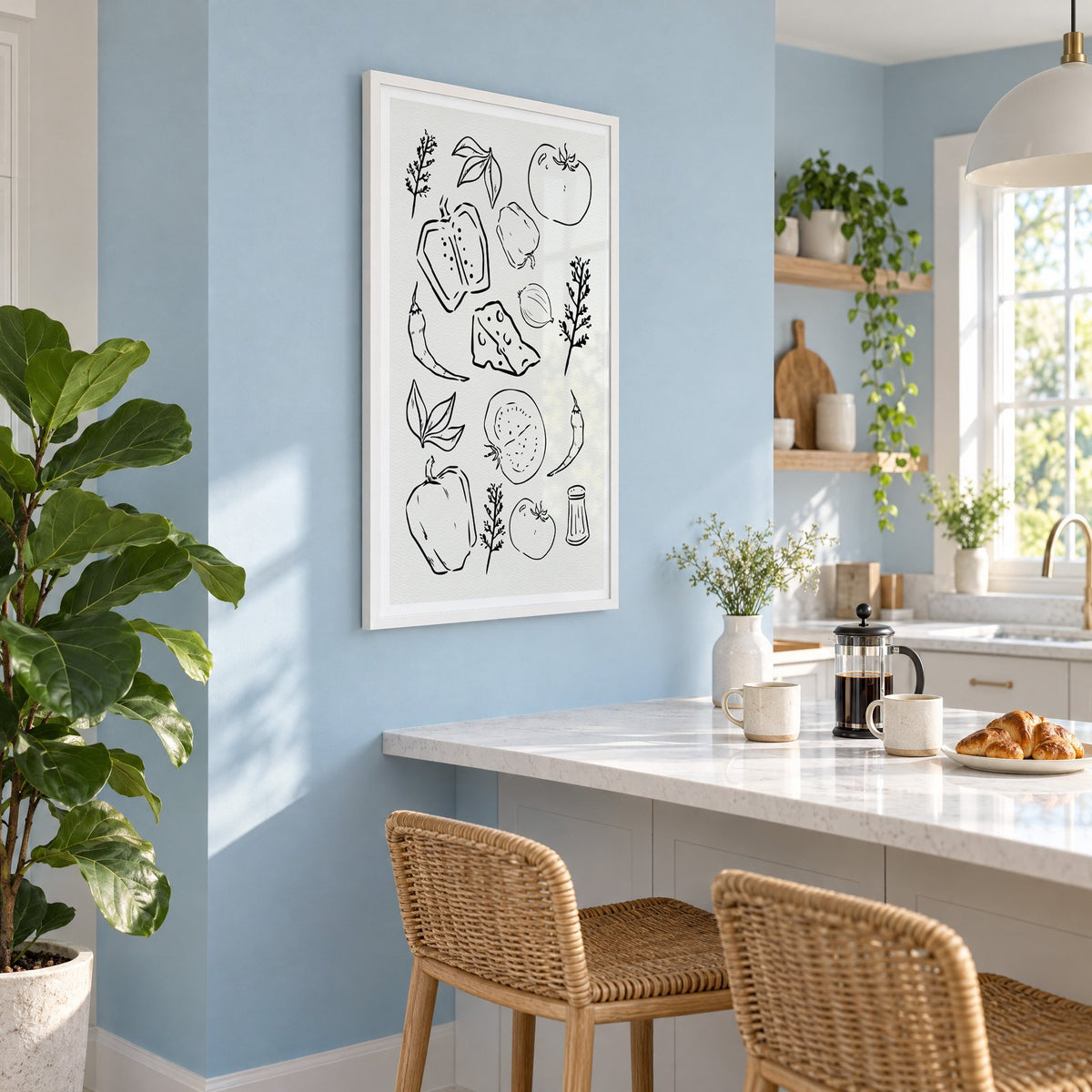 Veggie and cheese sketch on ivory print in a white frame on a pale blue wall above a breakfast bar with rattan stools