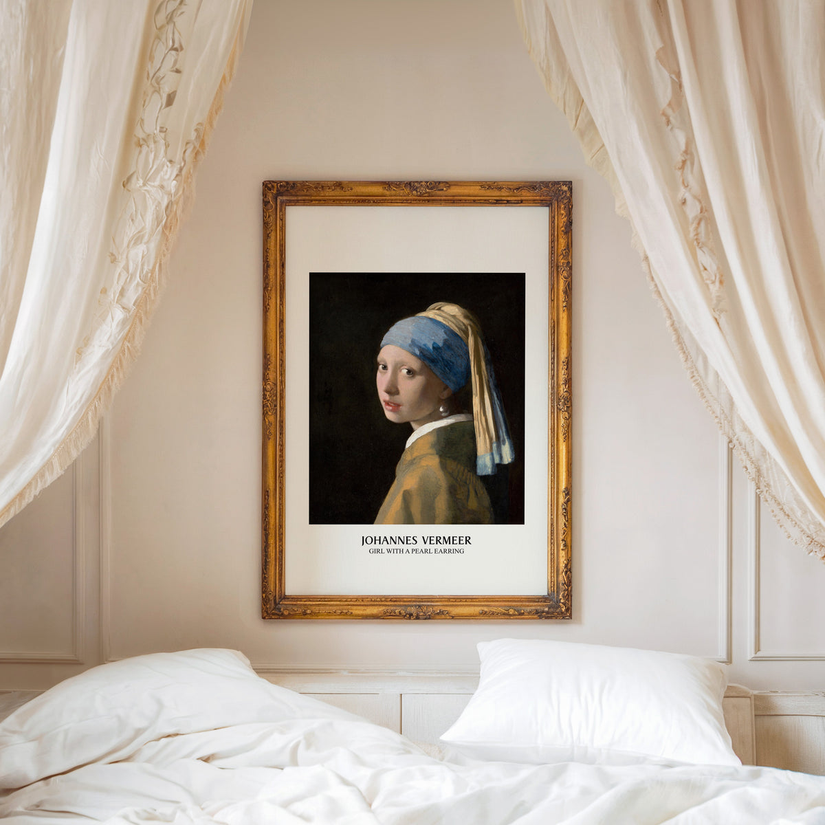 Girl with a Pearl Earring print shown in an ornate gold frame above a canopy bed