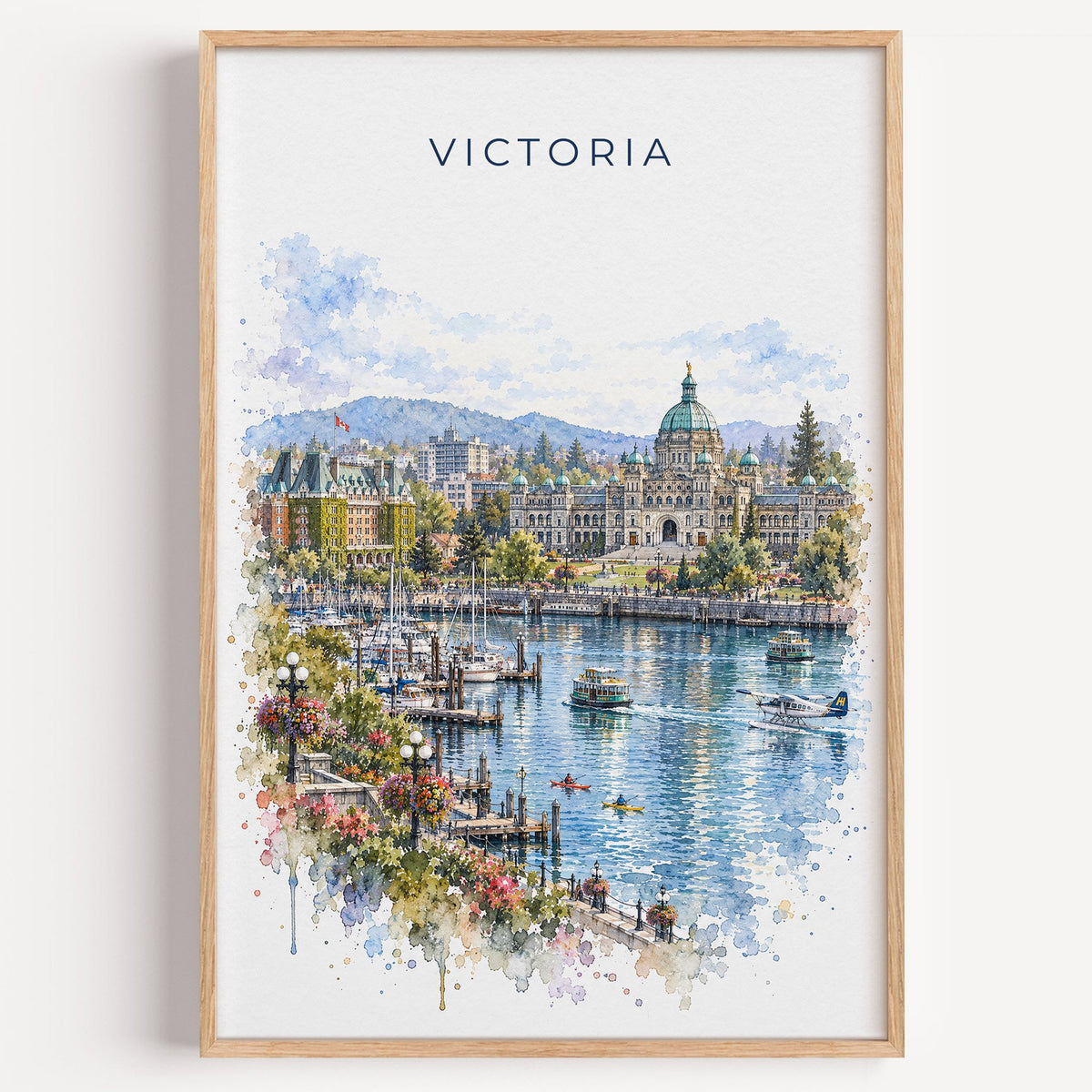 Victoria, Canada watercolor print in a light oak frame on a plain white wall
