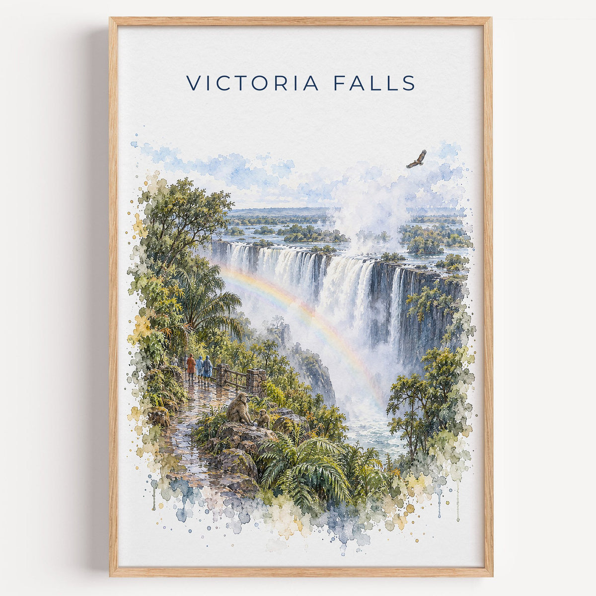 Victoria Falls watercolor print in a light oak frame on a plain white wall