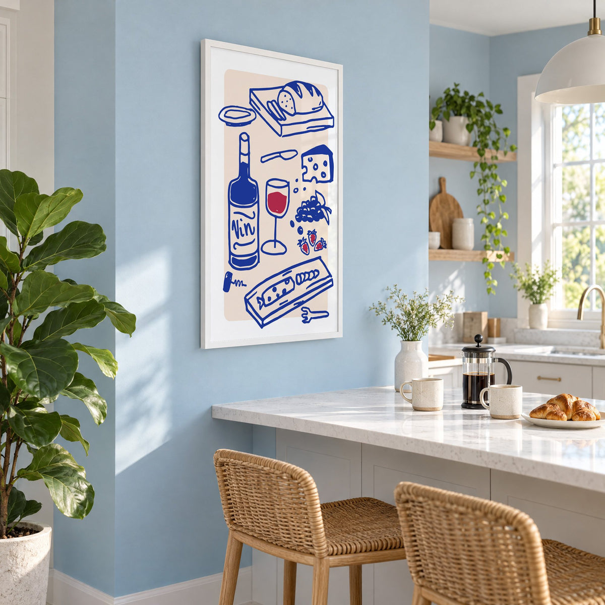 Vin wine and cheese spread print in a white frame on a pale blue wall above a breakfast bar with rattan stools