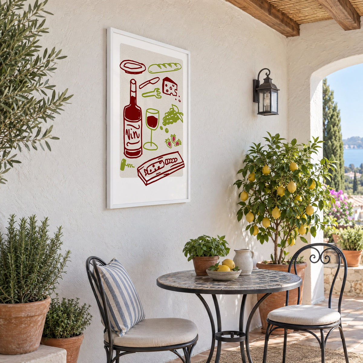 Vin wine picnic doodle print in a white frame on a sunny patio wall beside a potted lemon tree