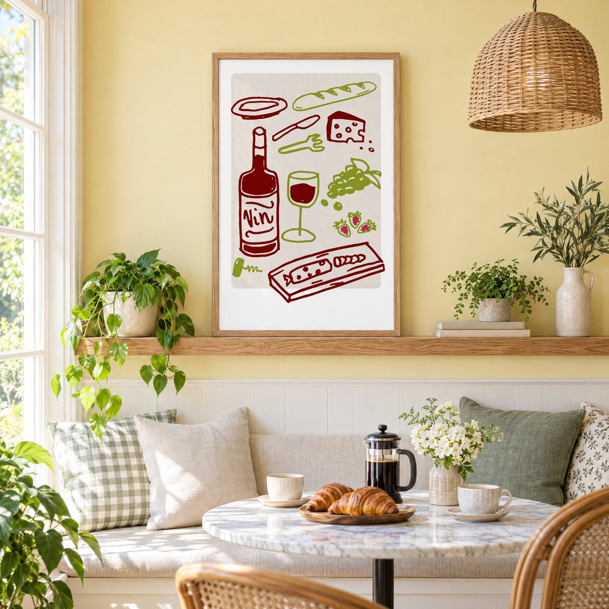 Vin wine picnic doodle print in an oak frame on a picture ledge above a sunny breakfast nook