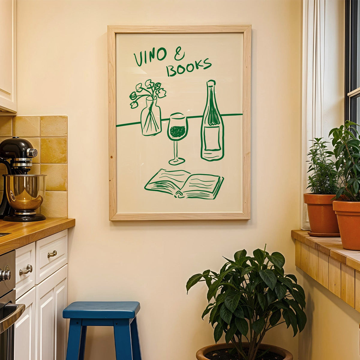 Vino and books green line print in a wood frame on a yellow tiled kitchen wall