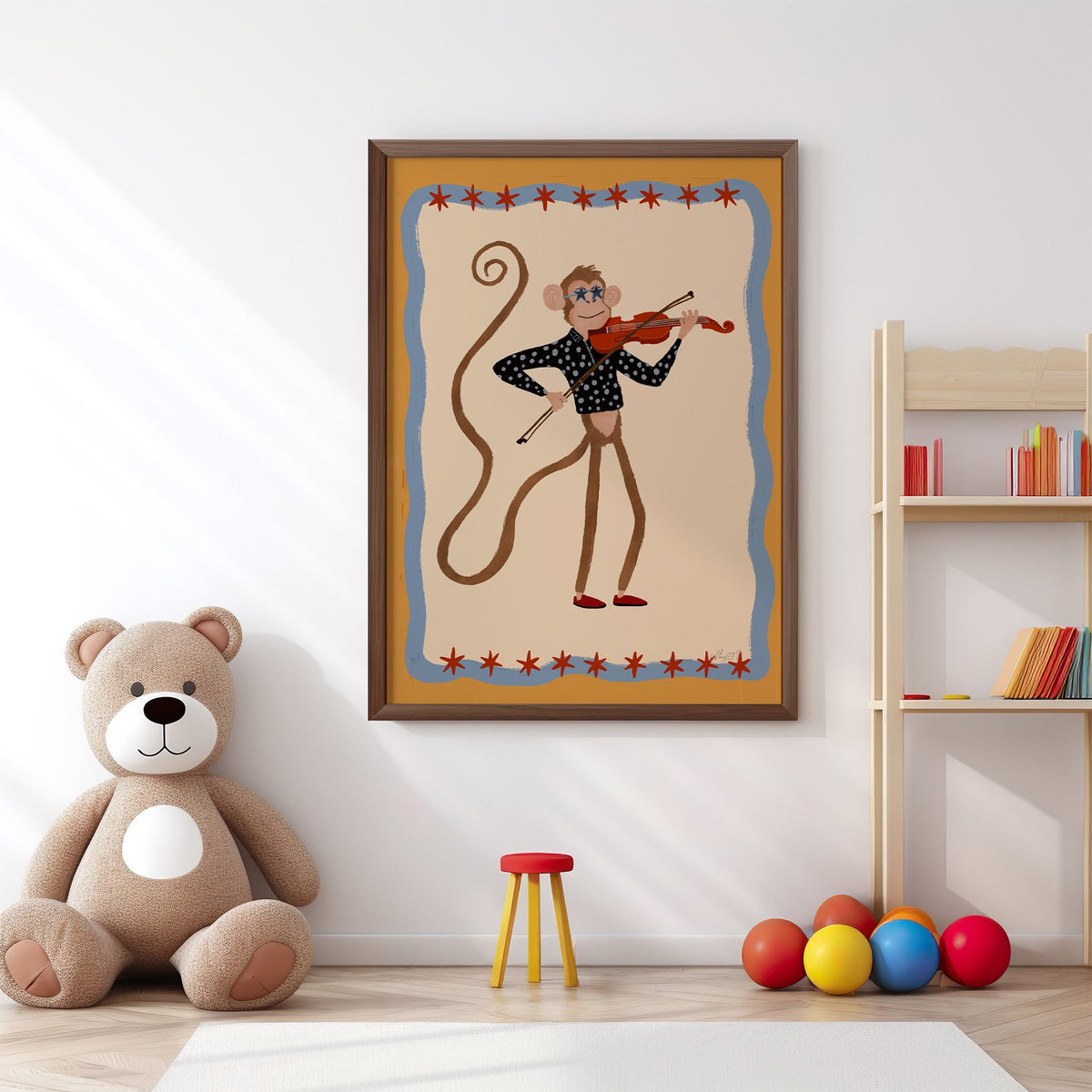 Monkey playing red violin nursery print in a walnut frame above a big teddy bear by a bookshelf