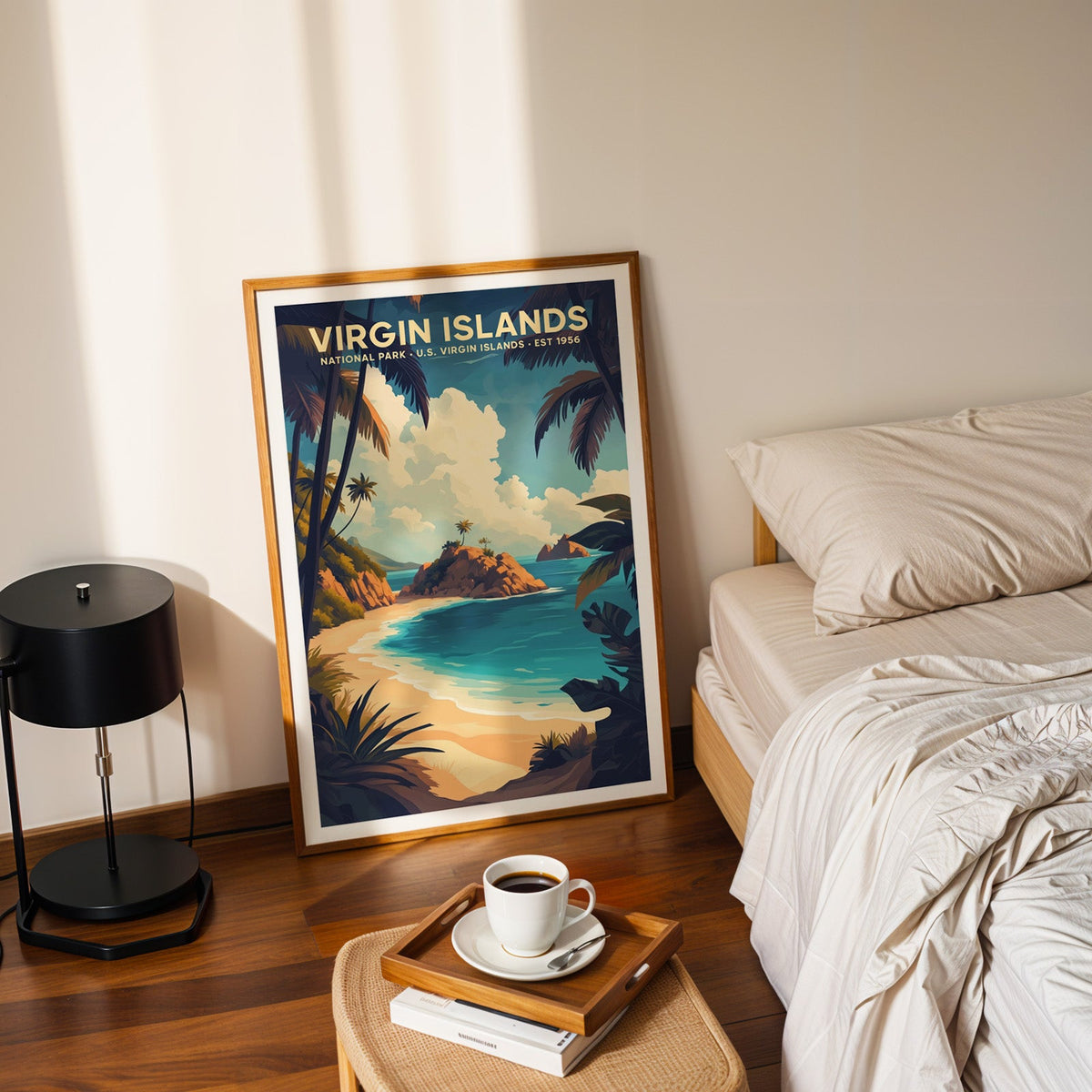 Virgin Islands National Park print in an oak frame leaning on a bedroom floor beside a coffee tray