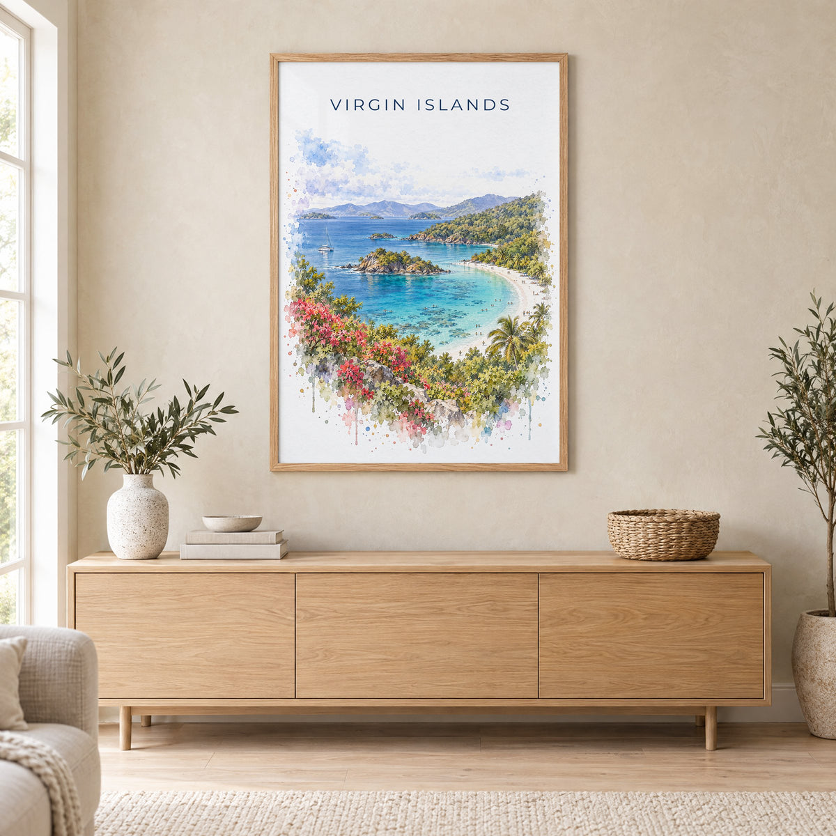 Virgin Islands National Park watercolor print in an oak frame above a light wood sideboard in a Scandinavian living room