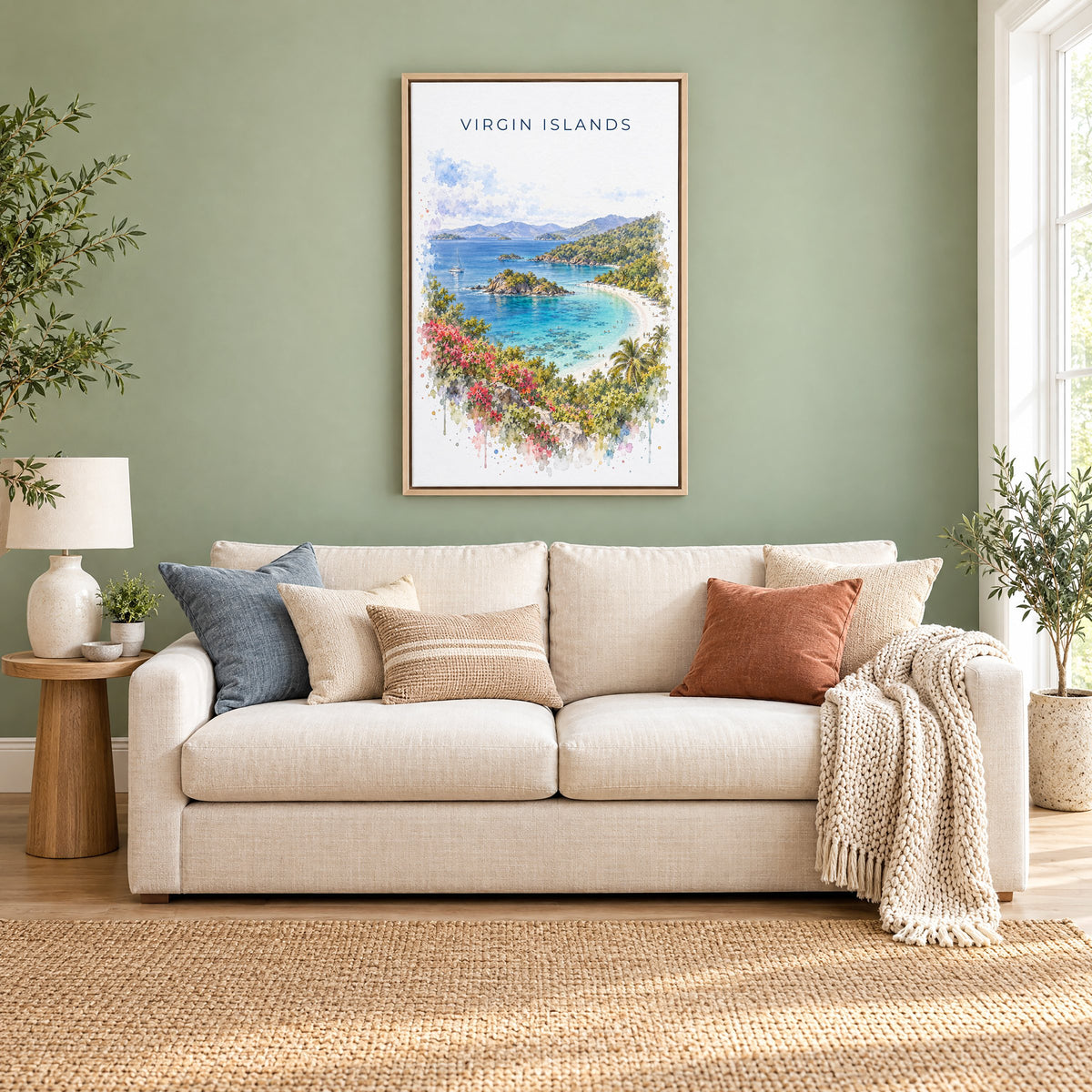 Virgin Islands National Park watercolor print as a natural floater canvas above a cream linen sofa on a sage green wall
