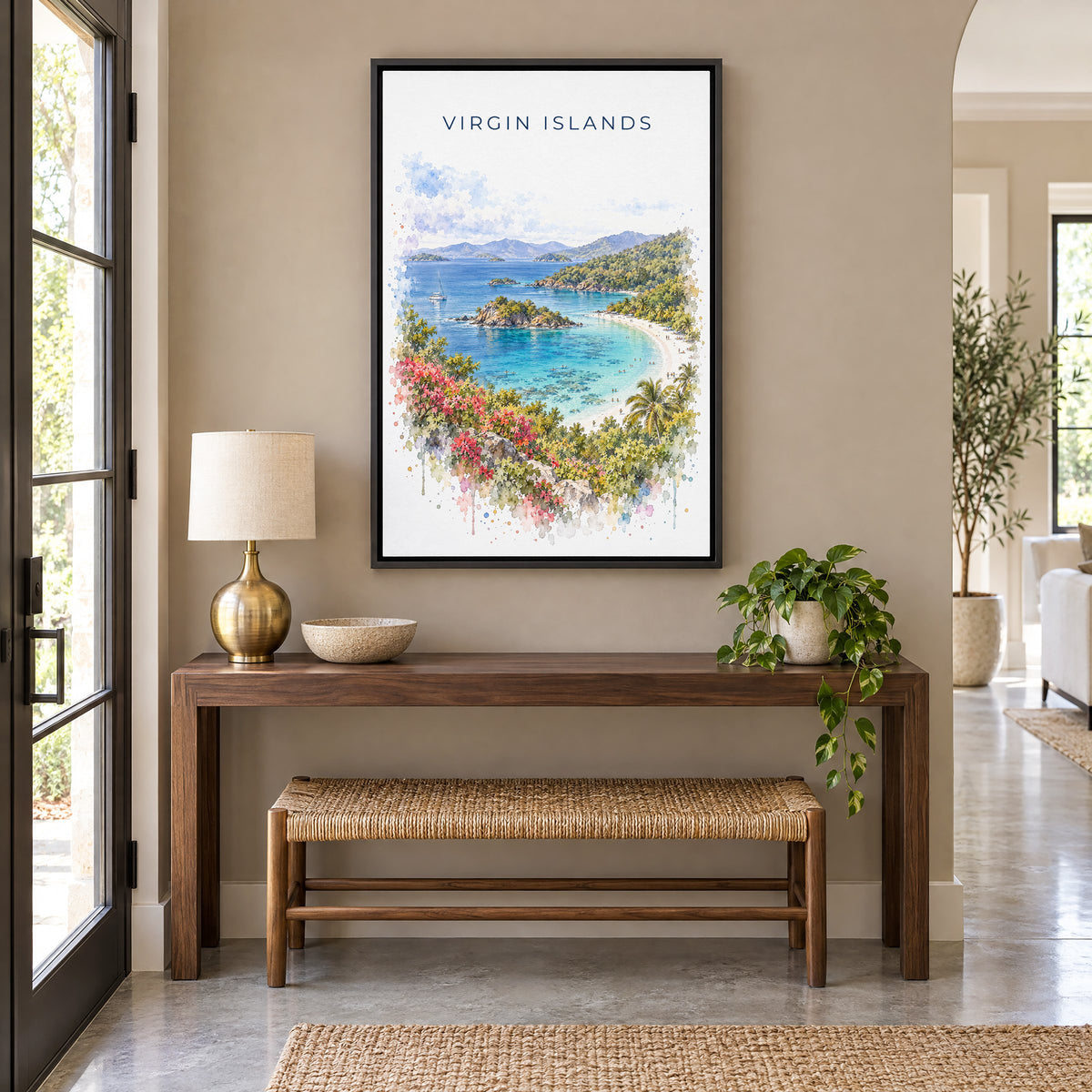 Virgin Islands National Park watercolor print as a black floater canvas above a walnut console and woven bench in an entryway
