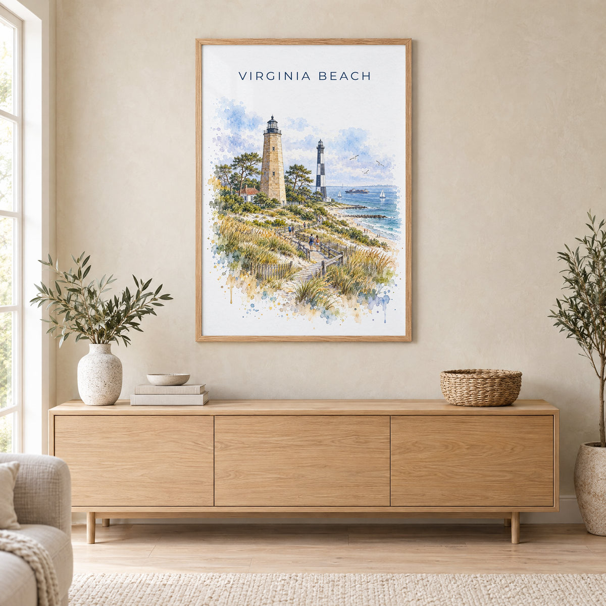 Virginia Beach watercolor print in an oak frame above a light wood sideboard in a Scandinavian living room
