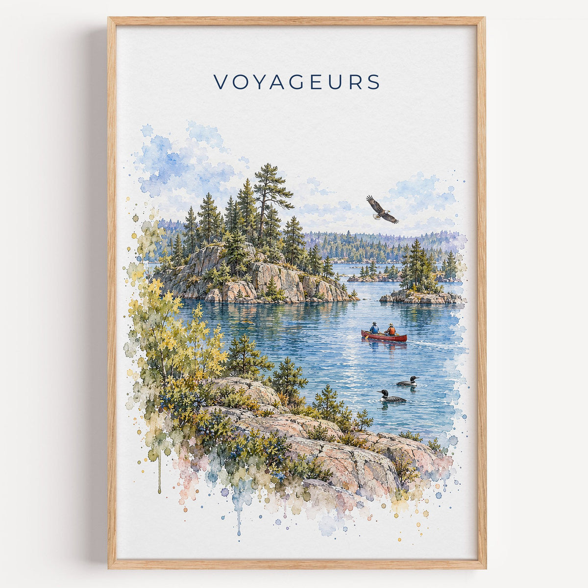 Voyageurs National Park watercolor print in a light oak frame on a plain white wall