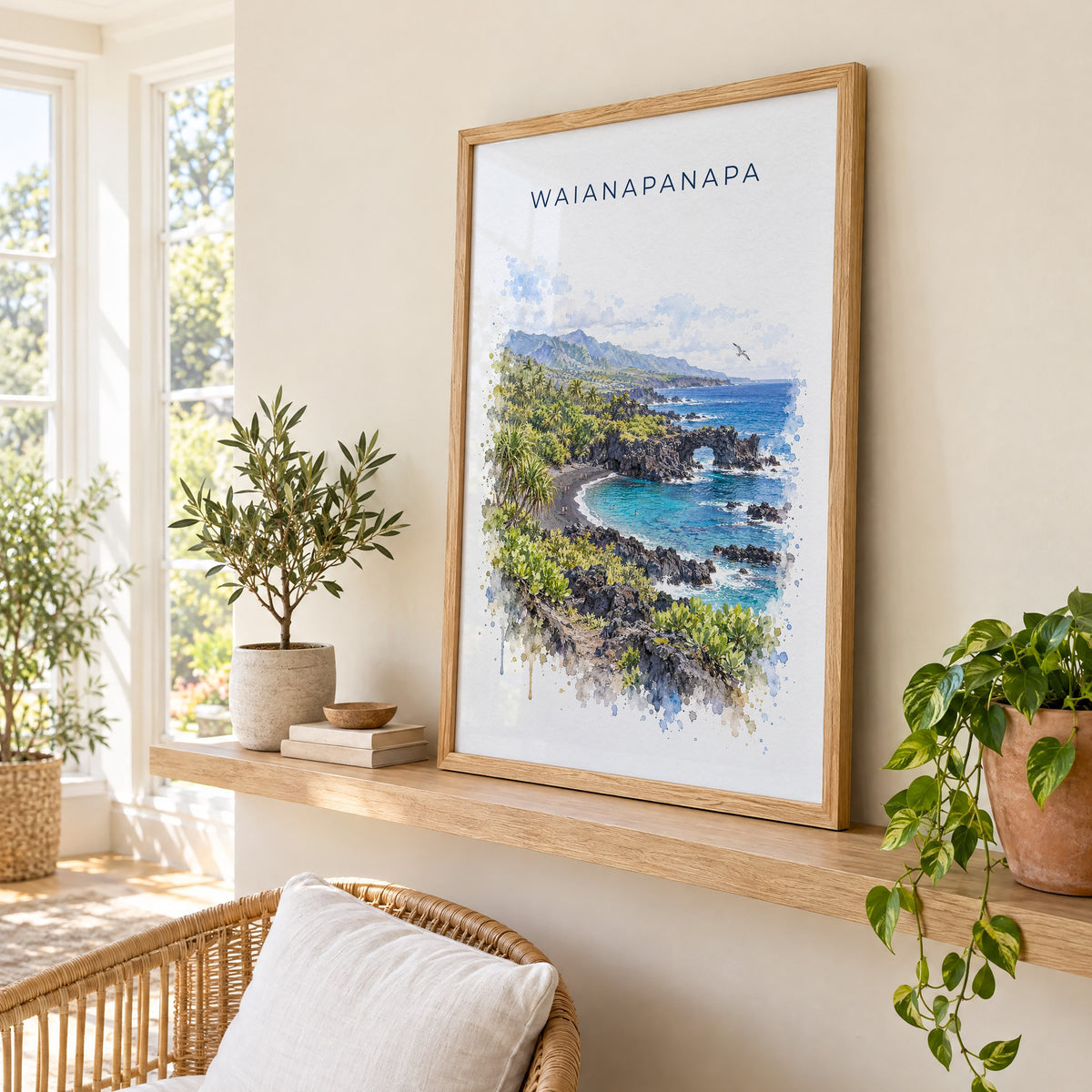 Waianapanapa State Park watercolor print in an oak frame on a picture ledge in a sunlit sunroom