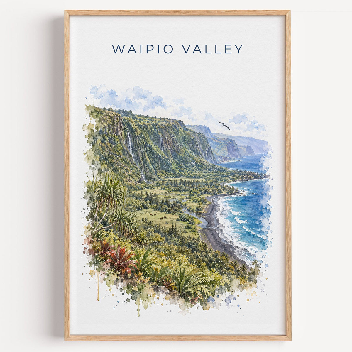 Waipio Valley watercolor print in a light oak frame on a plain white wall