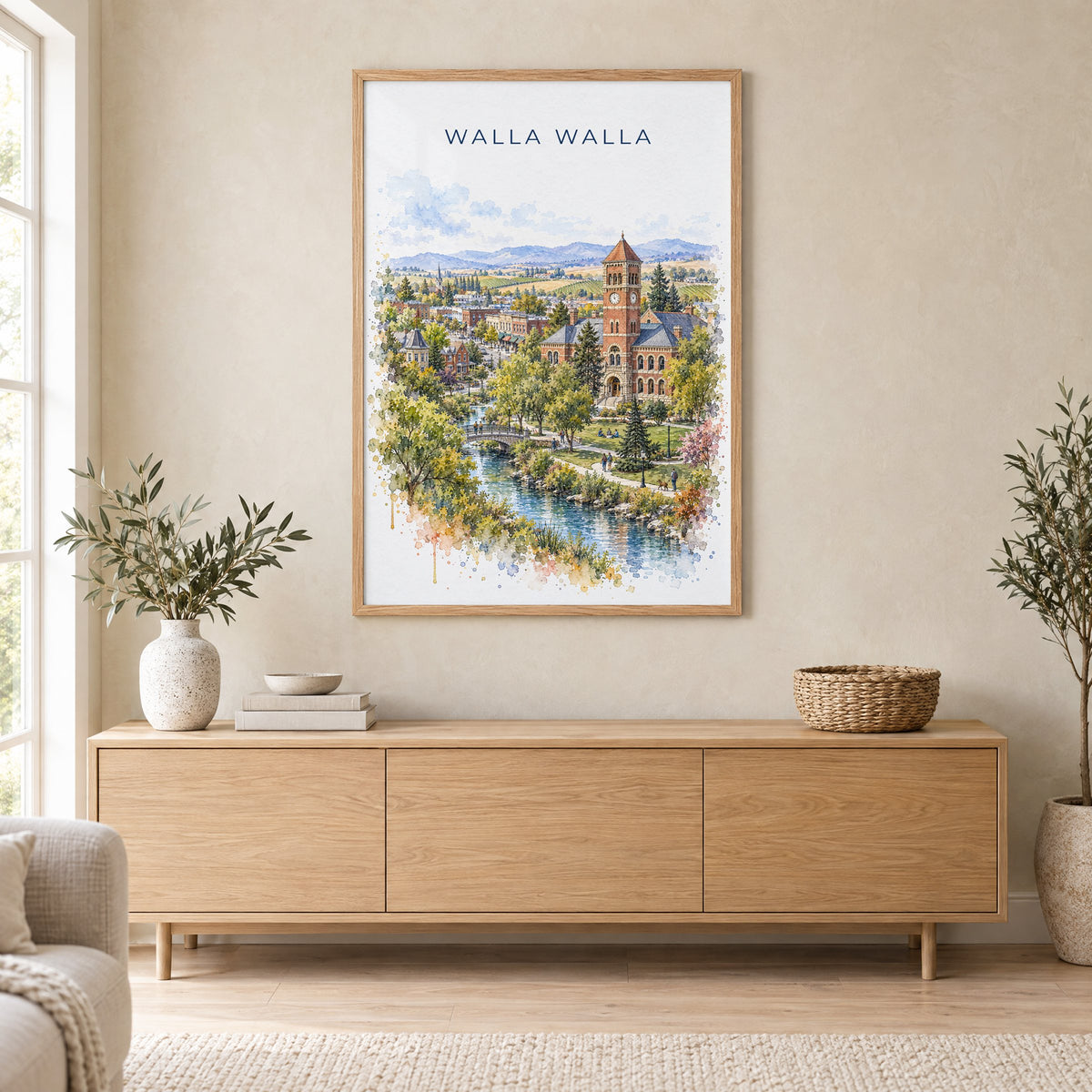 Walla Walla watercolor print in an oak frame above a light wood sideboard in a Scandinavian living room