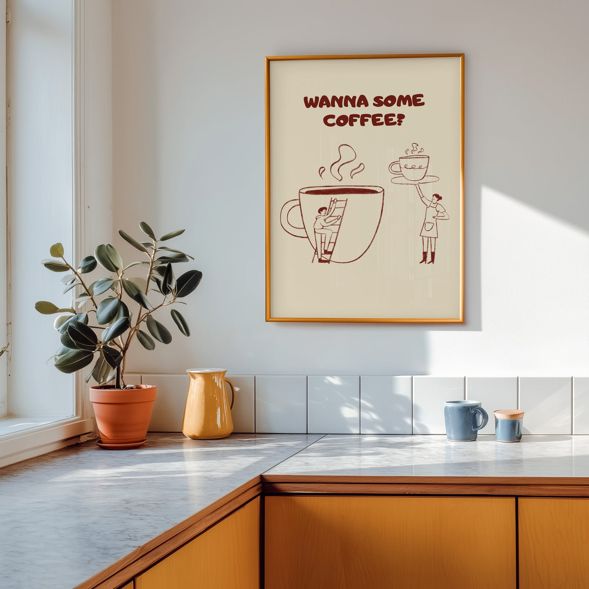 Wanna Some Coffee print shown in a gold frame above a marble counter with a yellow ceramic jug