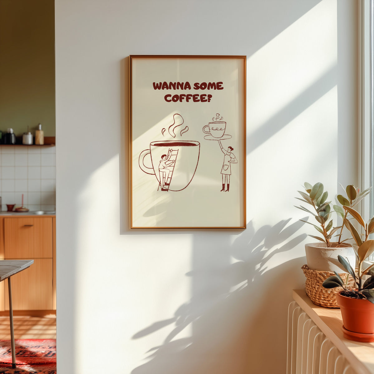 Wanna Some Coffee print shown in a gold frame in sunlight with plants and a kitchen beyond