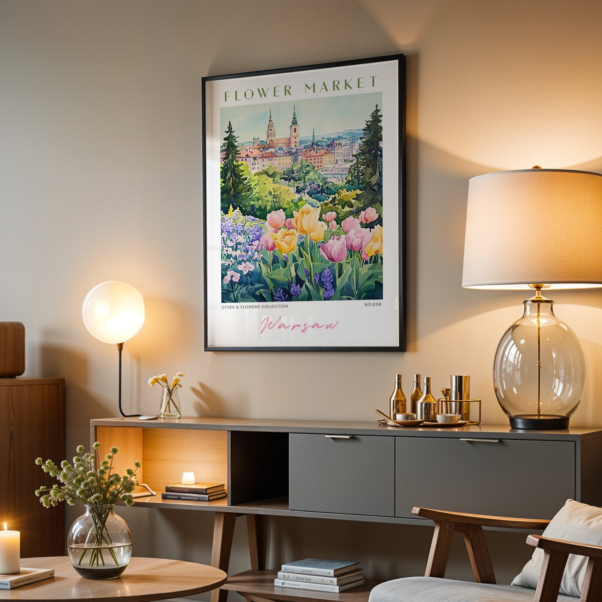 Warsaw flower market print in a black frame above a grey media console with a glass table lamp