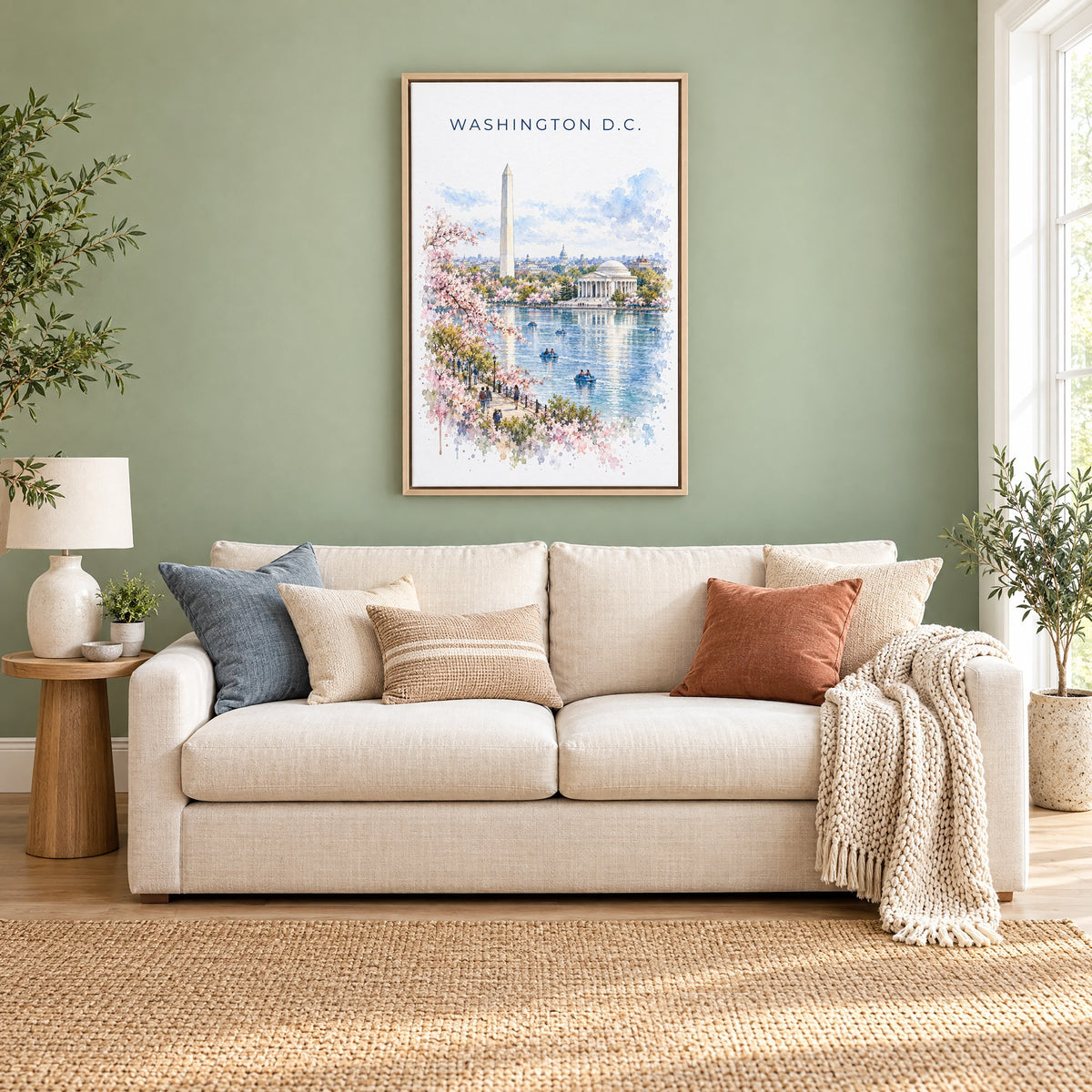 Washington, D.C. watercolor print as a natural floater canvas above a cream linen sofa on a sage green wall