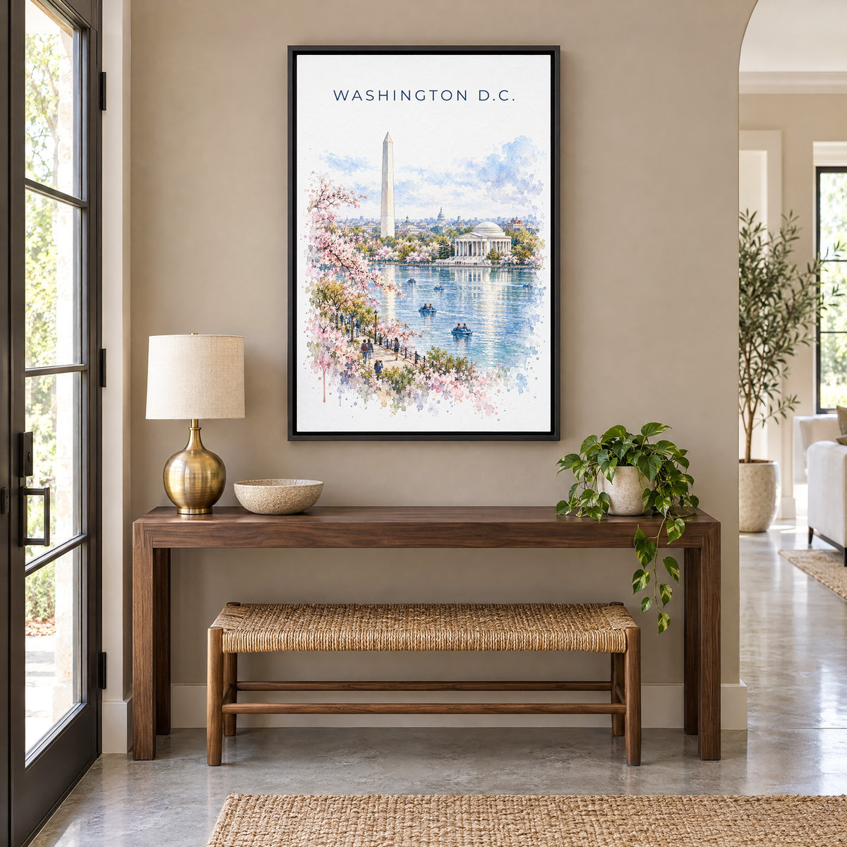 Washington, D.C. watercolor print as a black floater canvas above a walnut console and woven bench in an entryway
