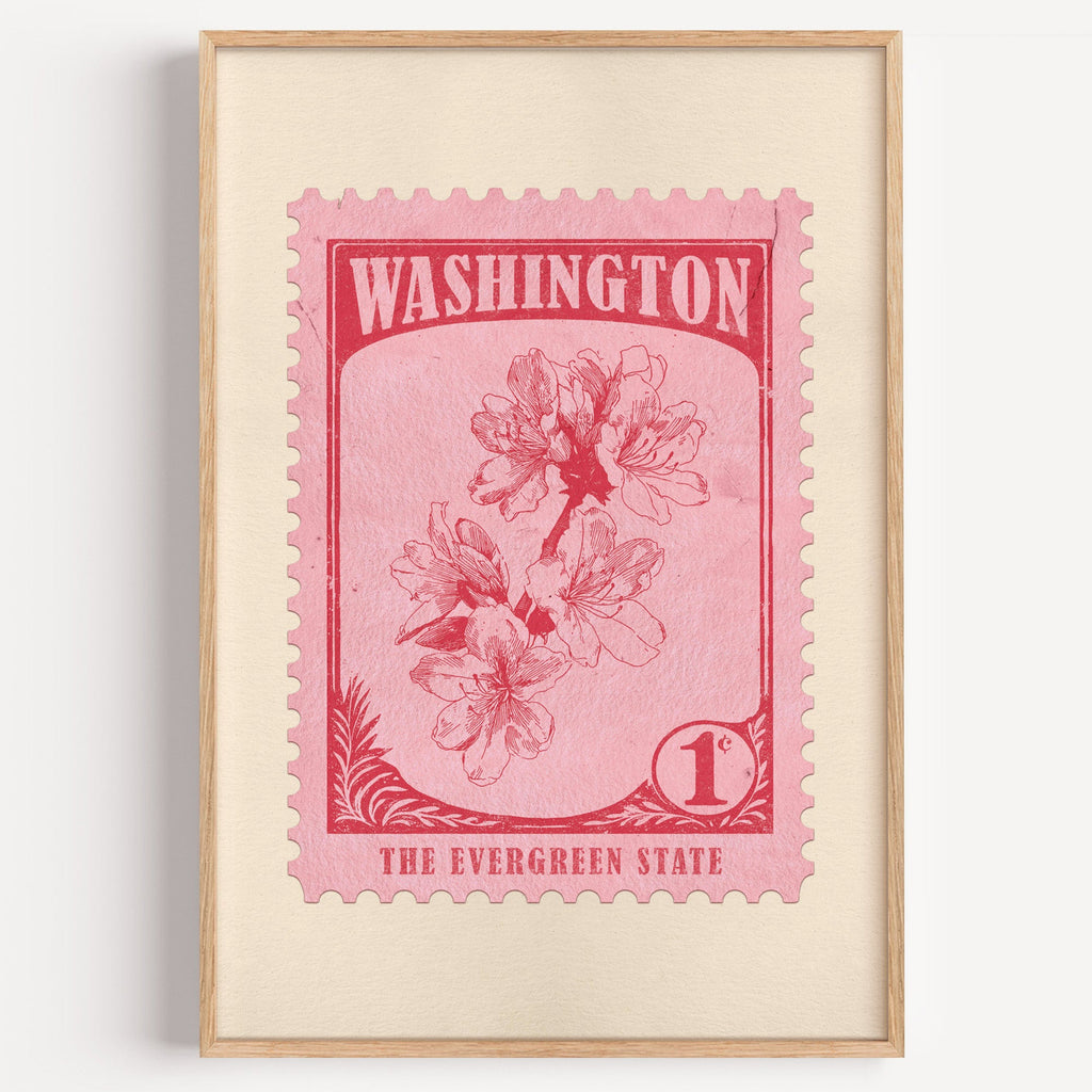 Washington state flower stamp print in crimson on pink, light oak frame on a plain white wall