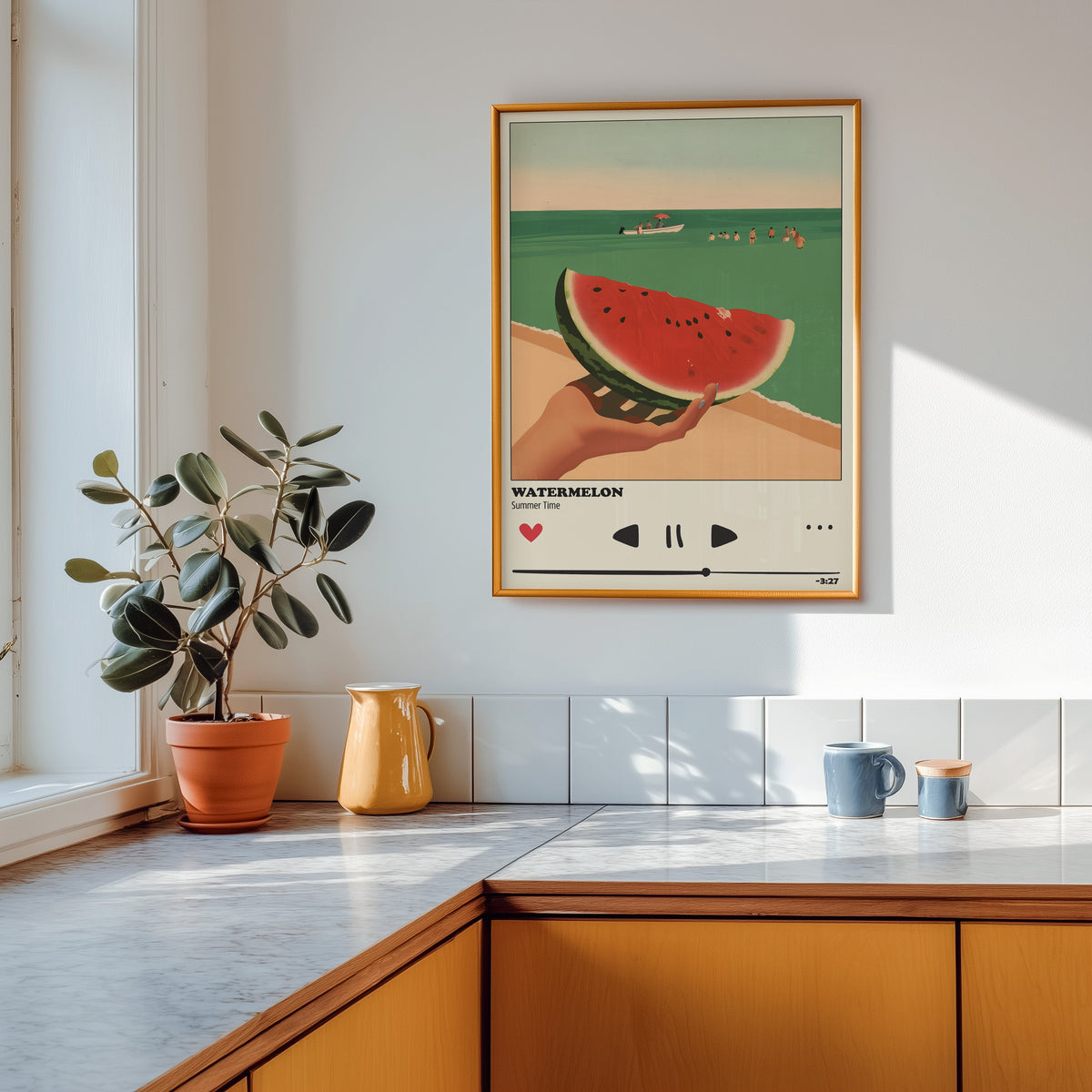 Watermelon Summer print shown in a gold frame above a marble counter in a tan kitchen