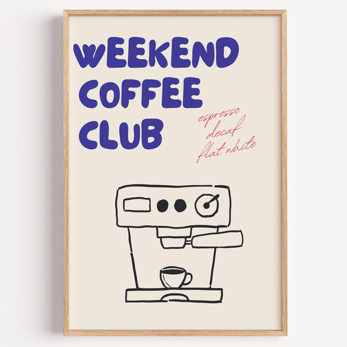 Weekend Coffee Club espresso machine print in a light oak frame on a plain white wall