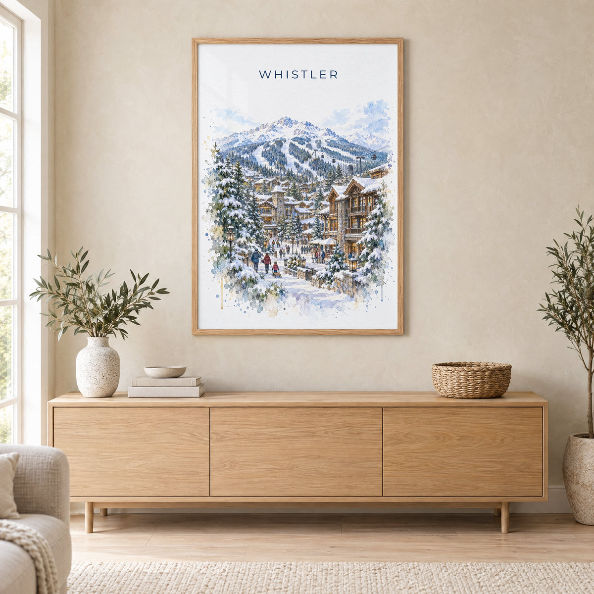 Whistler watercolor print in an oak frame above a light wood sideboard in a Scandinavian living room