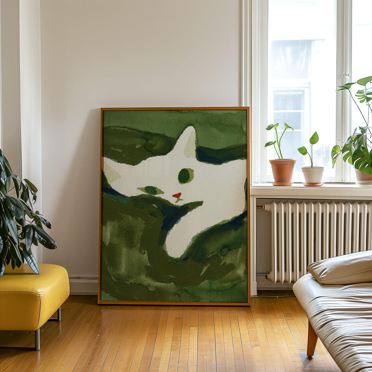 Modern white cat print in an oak frame leaning beside a yellow leather bench