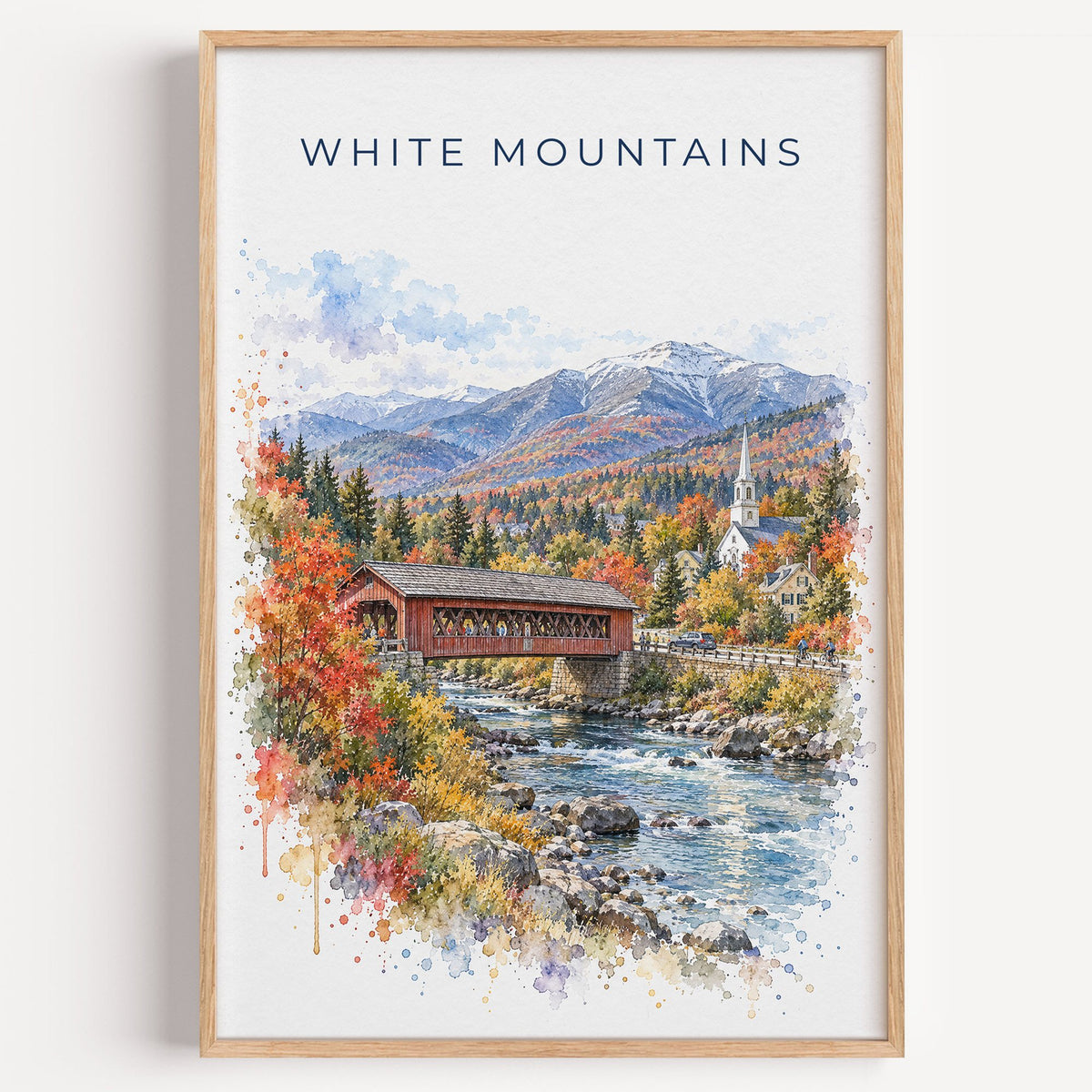 White Mountains, New Hampshire watercolor print in a light oak frame on a plain white wall