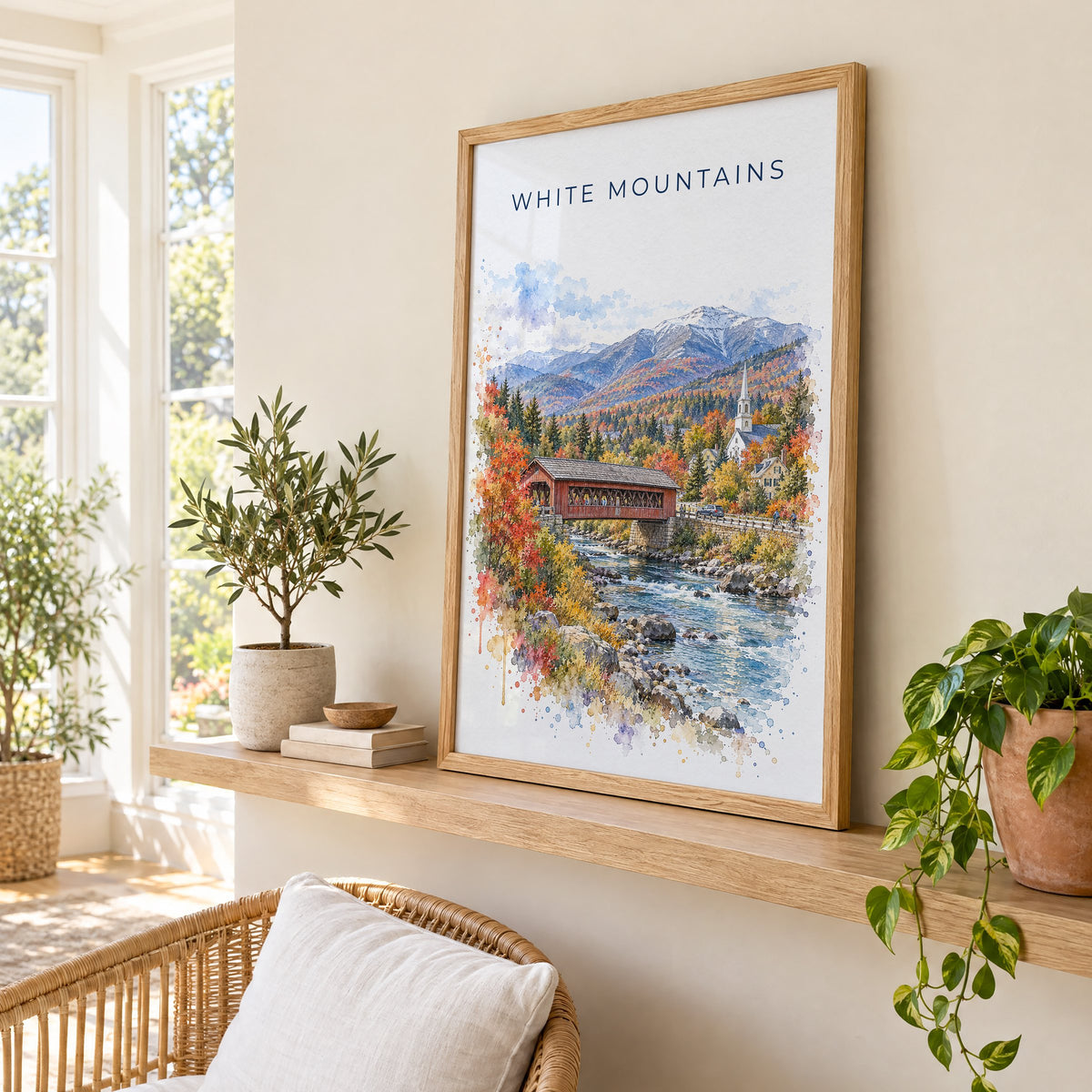 White Mountains, New Hampshire watercolor print in an oak frame on a picture ledge in a sunlit sunroom